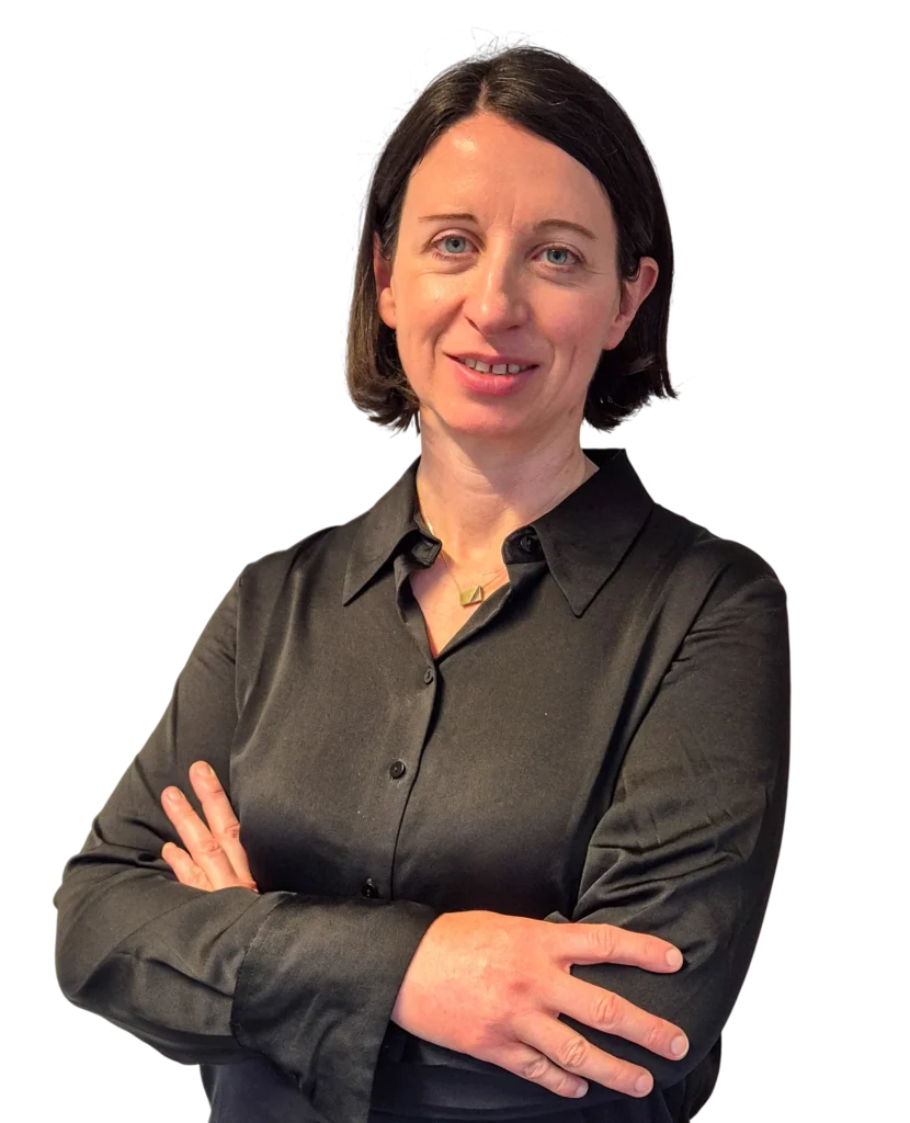 Confident professional woman in black shirt, arms crossed, isolated on white background.